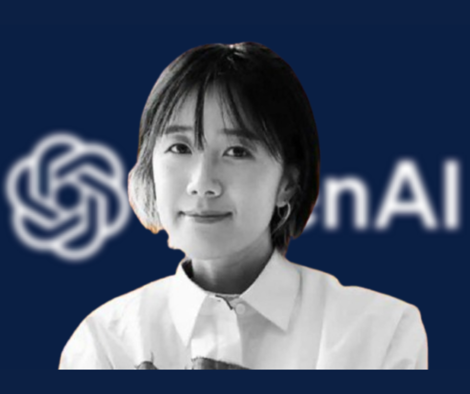 พนักงาน OpenAI คนหนึ่งถ่ายภาพคู่กับโลโก้บริษัท ภาพประกอบความเคลื่อนไหวภายในองค์กรหลังข่าวการลาออก